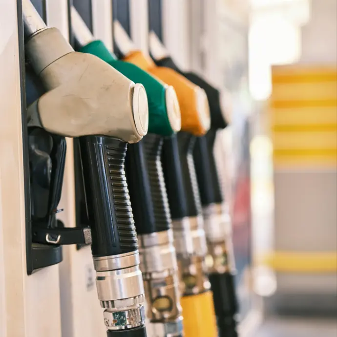 Fuel nozzles and hose rack for petroleum dispensing systems