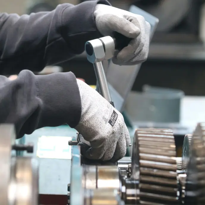 Technician providing maintenance service for petroleum equipment