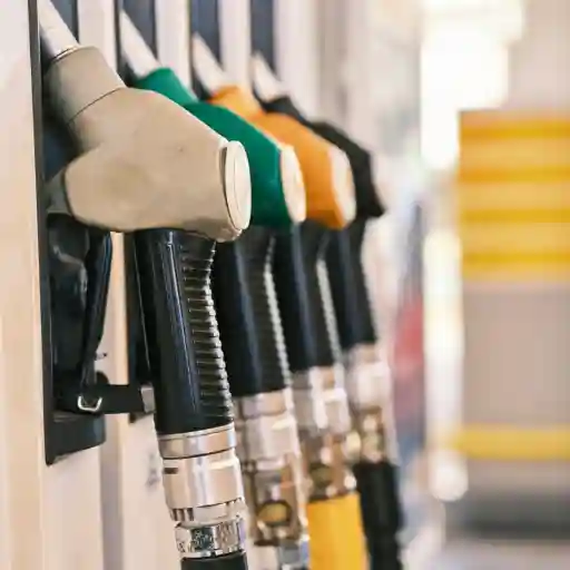 Fuel nozzles and hose rack for petroleum dispensing systems